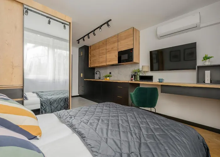 Modern Black & Wooden Apartment Warsaw Near The Airport By Noclegi Renters